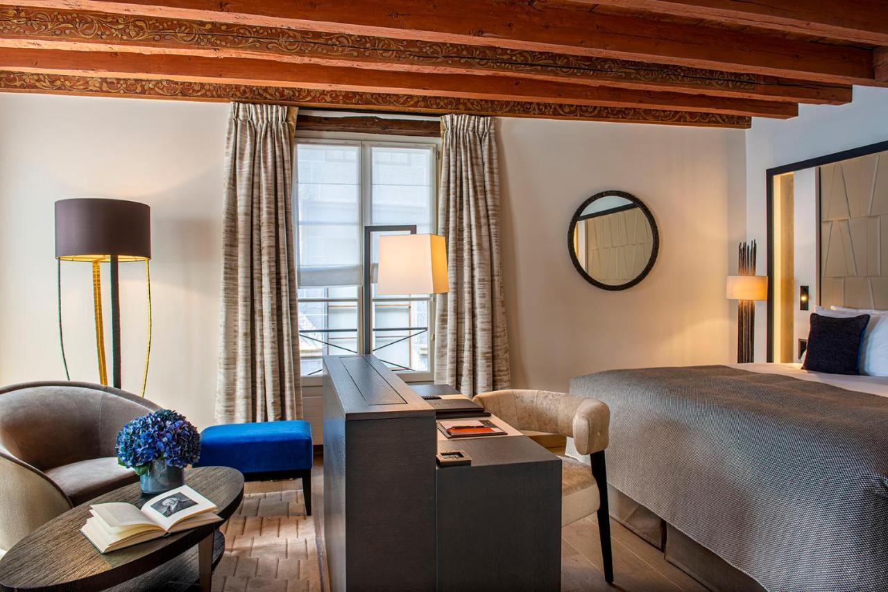 Hotel Les Armures Женева Екстер'єр фото A room at the Hotel de la Ville
